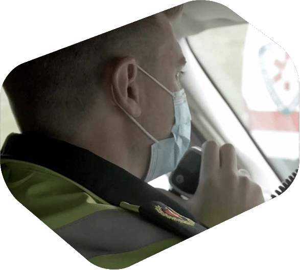 Side Profile of Paramedic Using Radio while Driving - iTacit