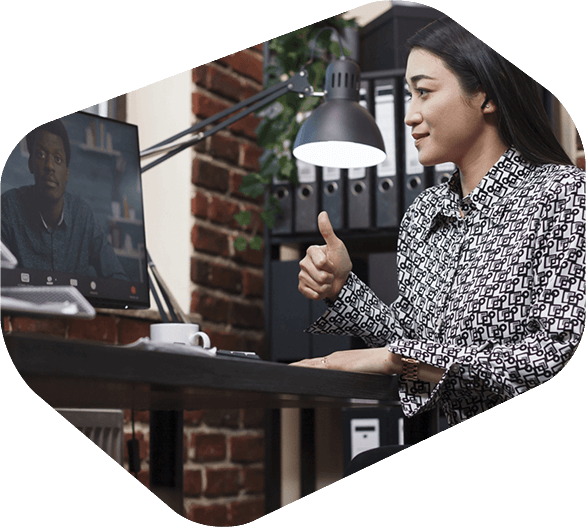 Government Employee on Zoom Meeting Giving Thumbs Up to Co Worker