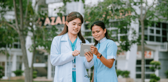Healthcare professionals using iPad