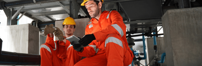two safety workers using itacit to report a safety incident